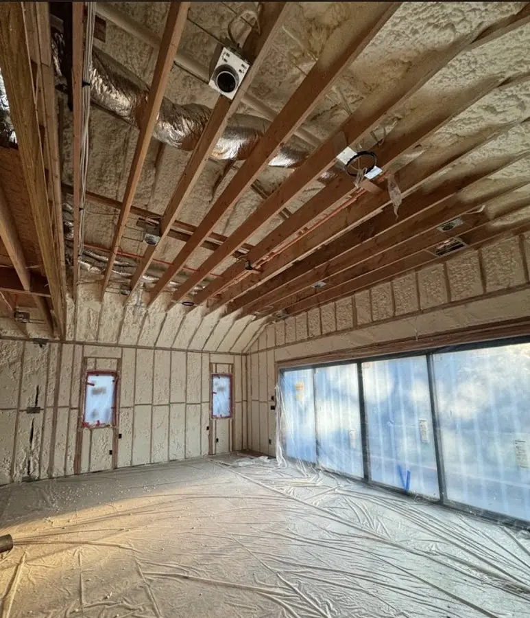 Interior walls and ceiling insulated with spray foam during new construction in Bethalto